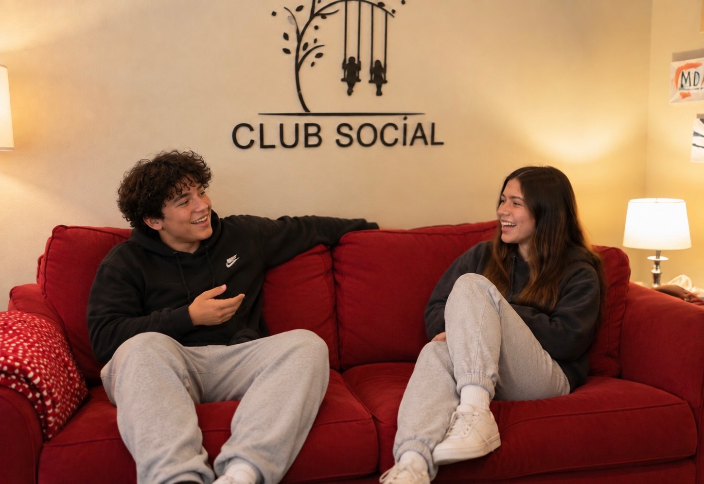 Club Social friends talking on the couch